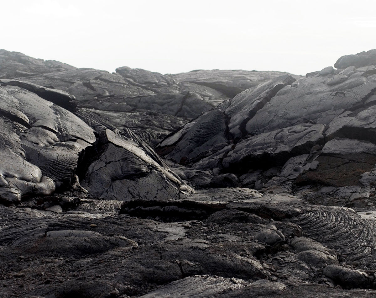 black surface of solidified volcanic lava flow, hawaii