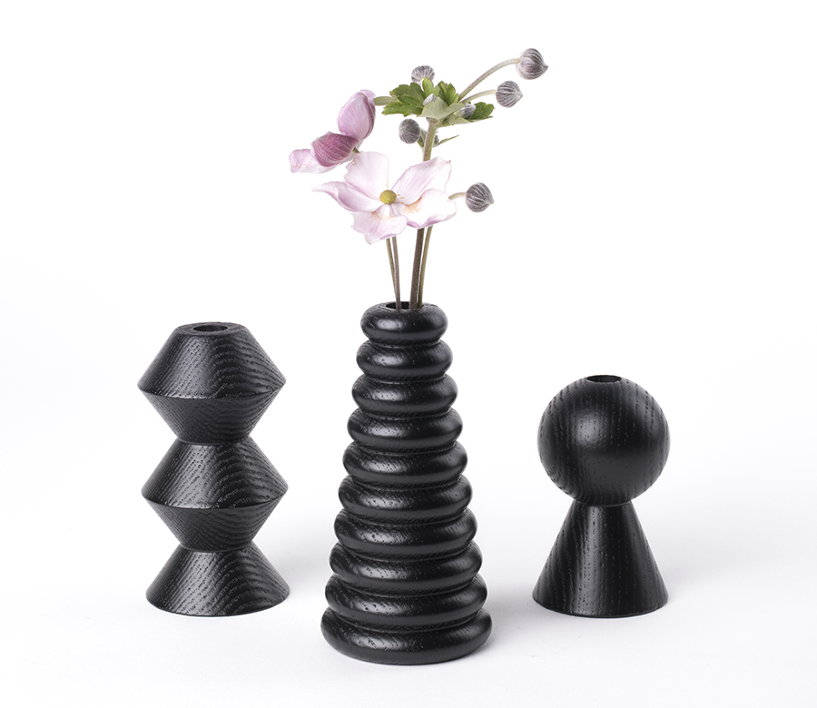 black bud vase by Cofield