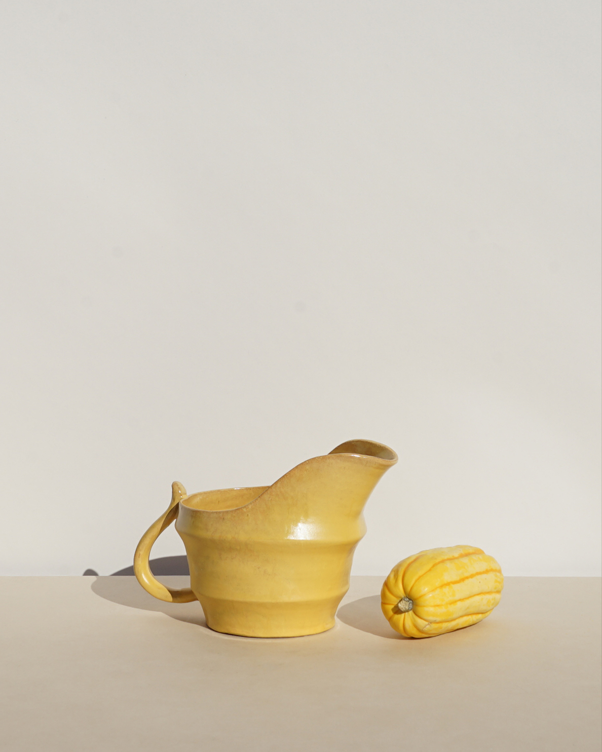 allan_ebeling_pitcher_yellow_glaze_1