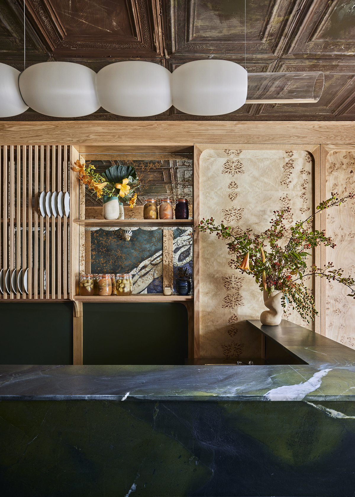 An Emerald Green Sushi Counter and OneOff Parrot Wallpaper Turn This